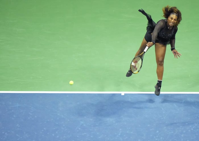 Serena Williams serves during the 2022 U.S. Open first round